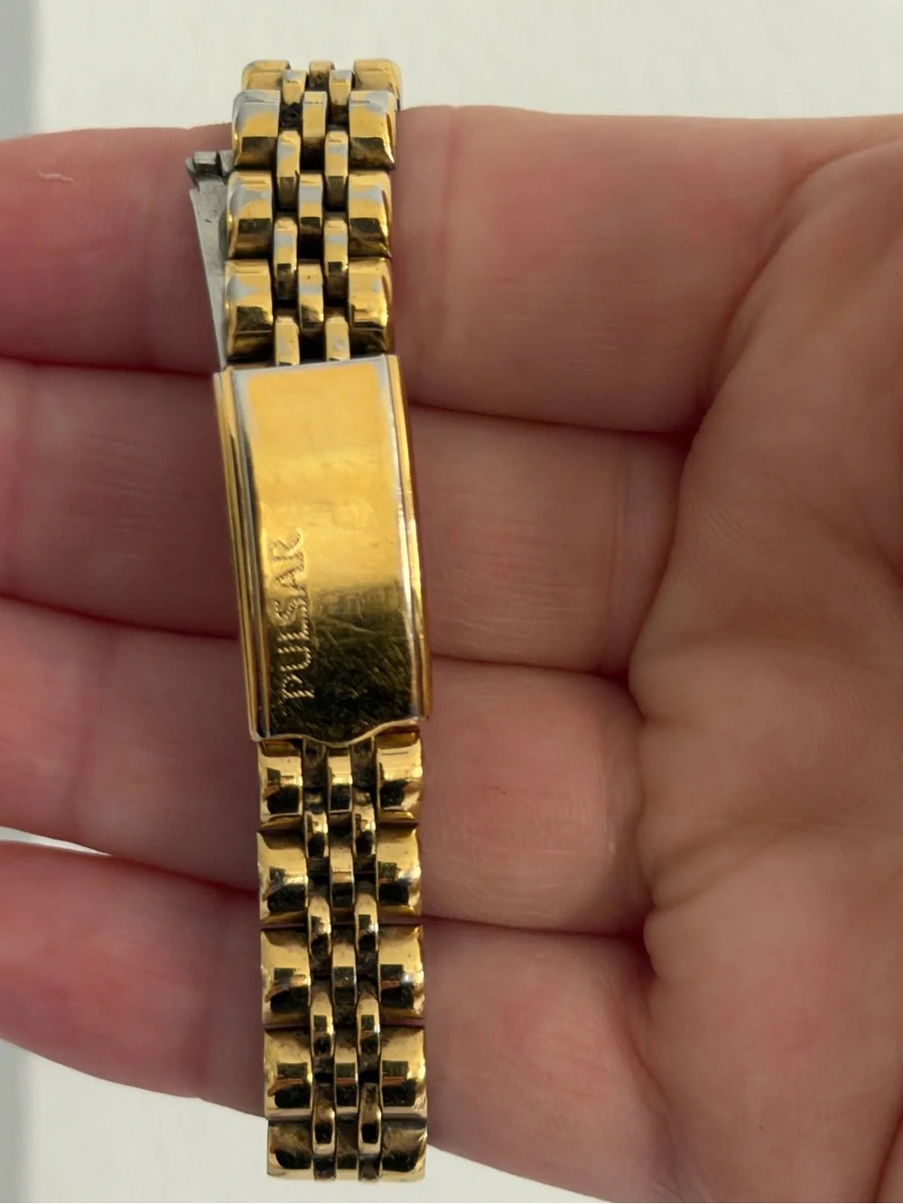 Vintage Pulsar Gold-Tone Watch with Black Dial